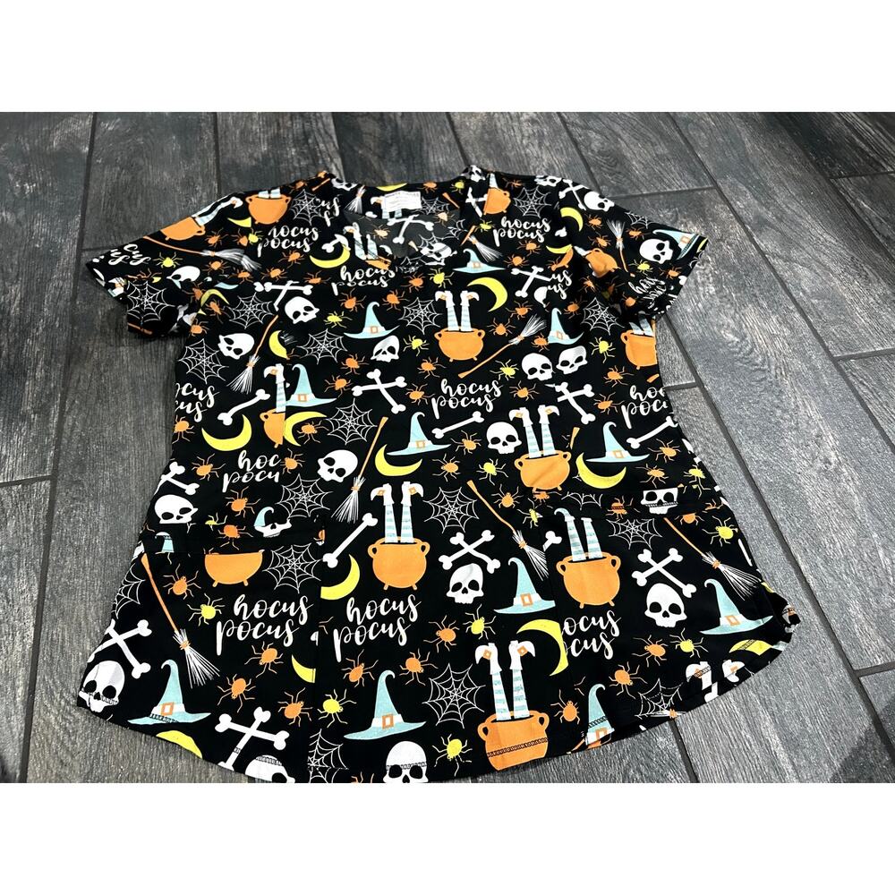 GENTLY USED WHITE CROSS "HOCUS POCUS" SCRUB TOP- MEDIUM